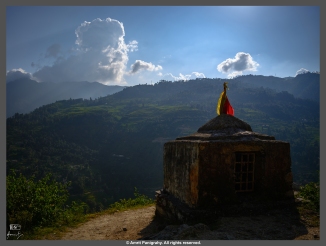 A temple by the mountain road, high in the Himalayas